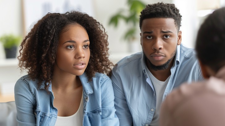 couple-listening-intently-stockcake